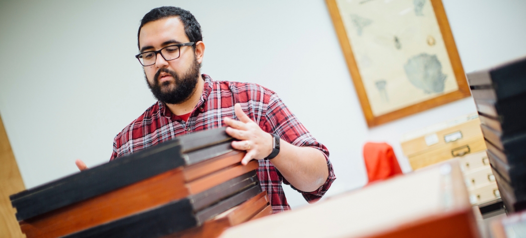 Vinicius Ferreira examines beetle collections